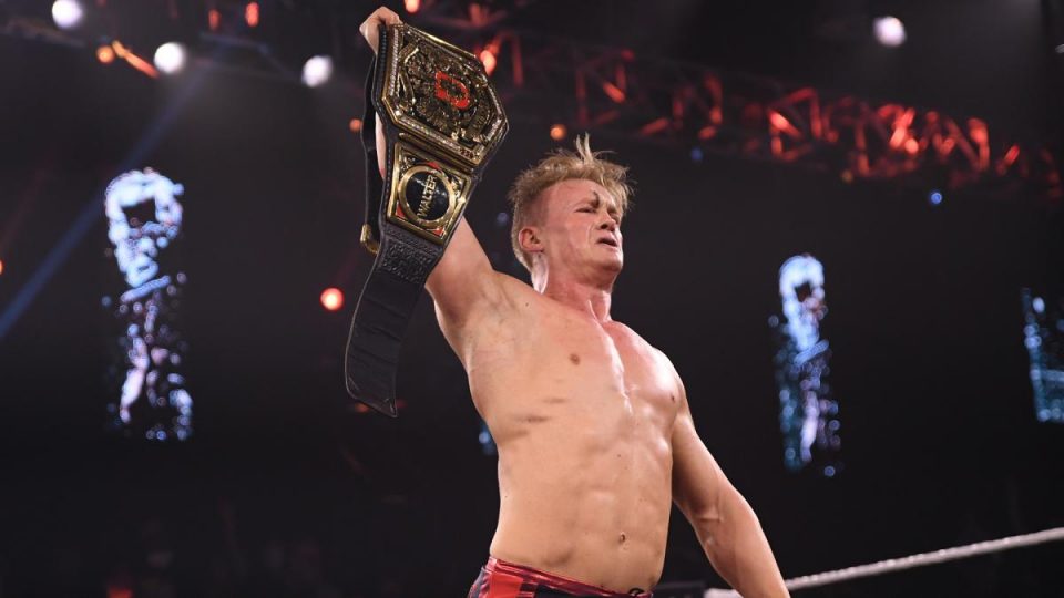 Ilja Dragunov poses with the NXT UK Championship