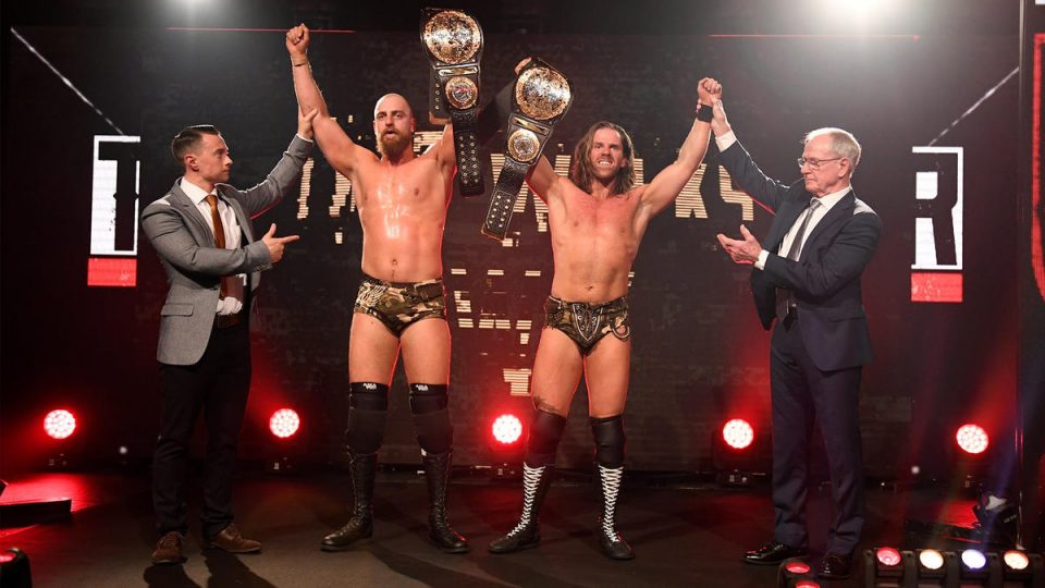 The Grizzled Young Veterans James Drake Zack Gibson celebrate as NXT UK Tag Team Champions at NXT UK TakeOver: Blackpool