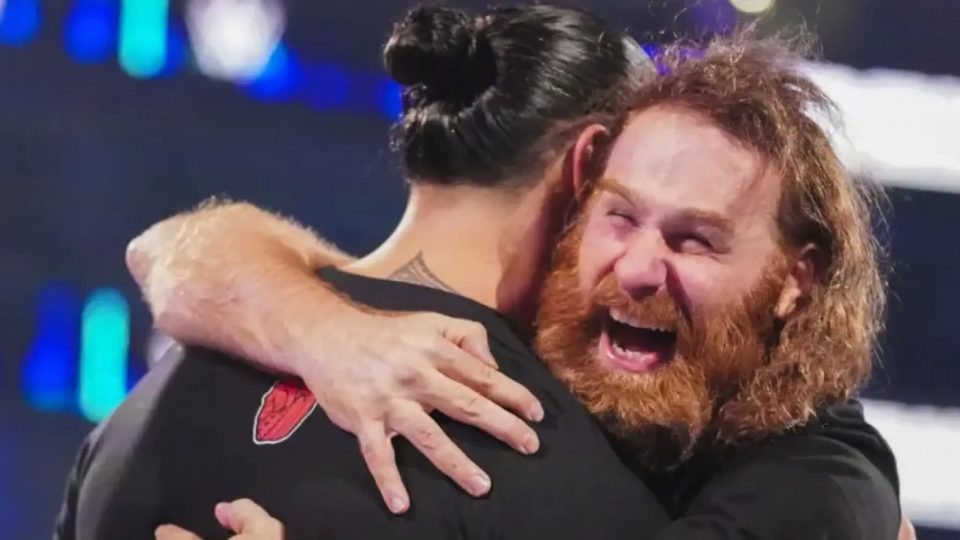 Sami Zayn and Roman Reigns