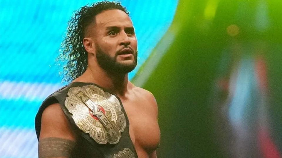 Tama Tonga celebrating after winning the NEVER Openweight Championship at NJPW Wrestle Kingdom 18
