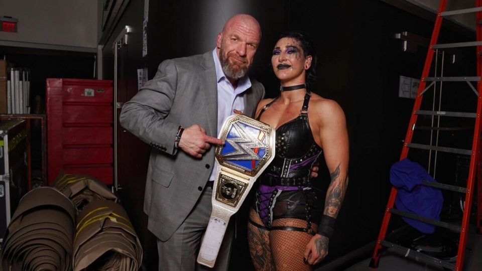 Triple H and Rhea Ripley with the WWE SmackDown Women's Championship