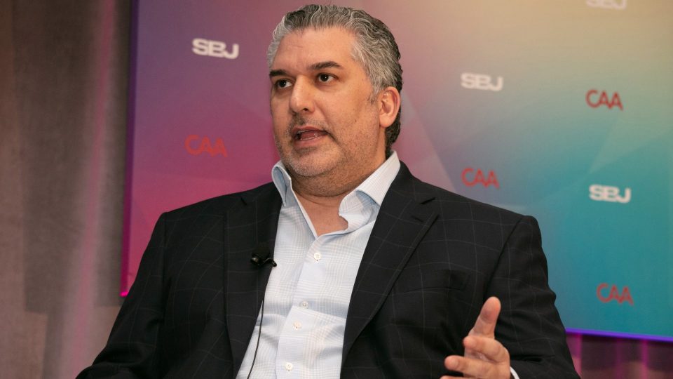 Nick Khan speaking at the CAA World Congress of Sports