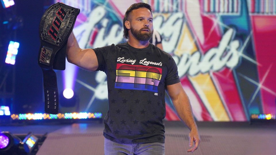 Cash Wheeler making his entrance in AEW with the ROH World Tag Team Championship