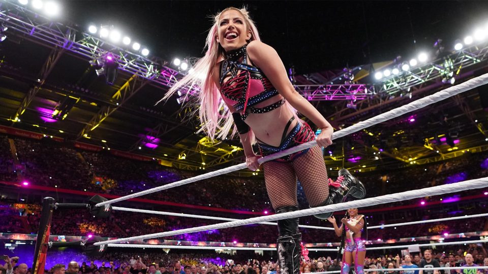 Alexa Bliss posing during her entrance at WWE Clash At The Castle 2022