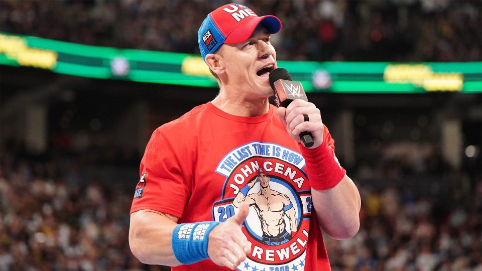 John Cena speaking on a microphone during WWE Money In The Bank 2024