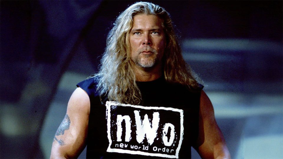 Kevin Nash standing on the entrance ramp wearing an nWo shirt