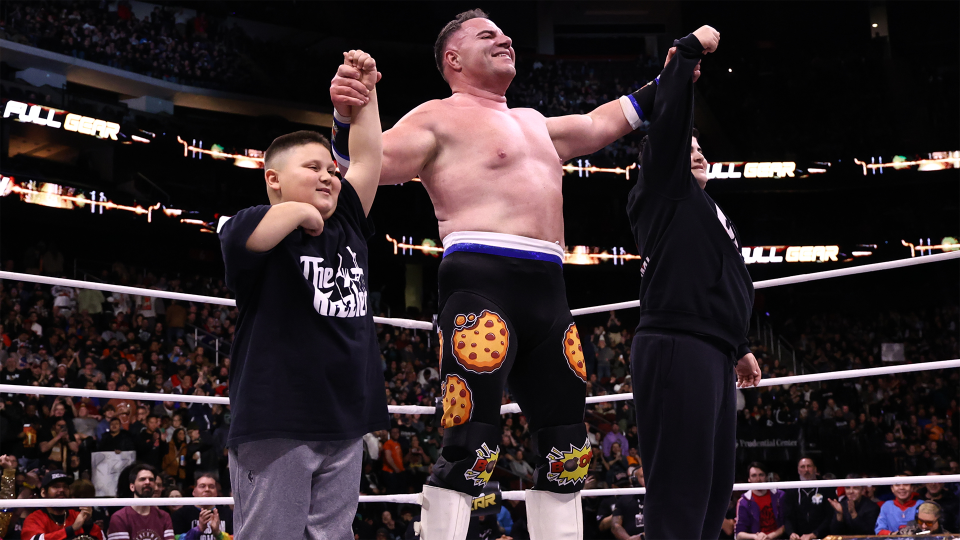 The Rizzler (left) and The Costco Guys, Big Boom AJ (middle) and Big Justice (right), in the ring at AEW Full Gear 2024